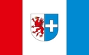 Flaga herbowa w proporcjach 5:8 składa się z trzech pionowych pasów: (od drzewca) czerwonego 1/4 szerokości flagi, białego 2/4 szerokości flagi i błękitnego 1/4 szerokości flagi, na której w pasie białym umieszczono centralnie herb Gminy Kołbaskowo.